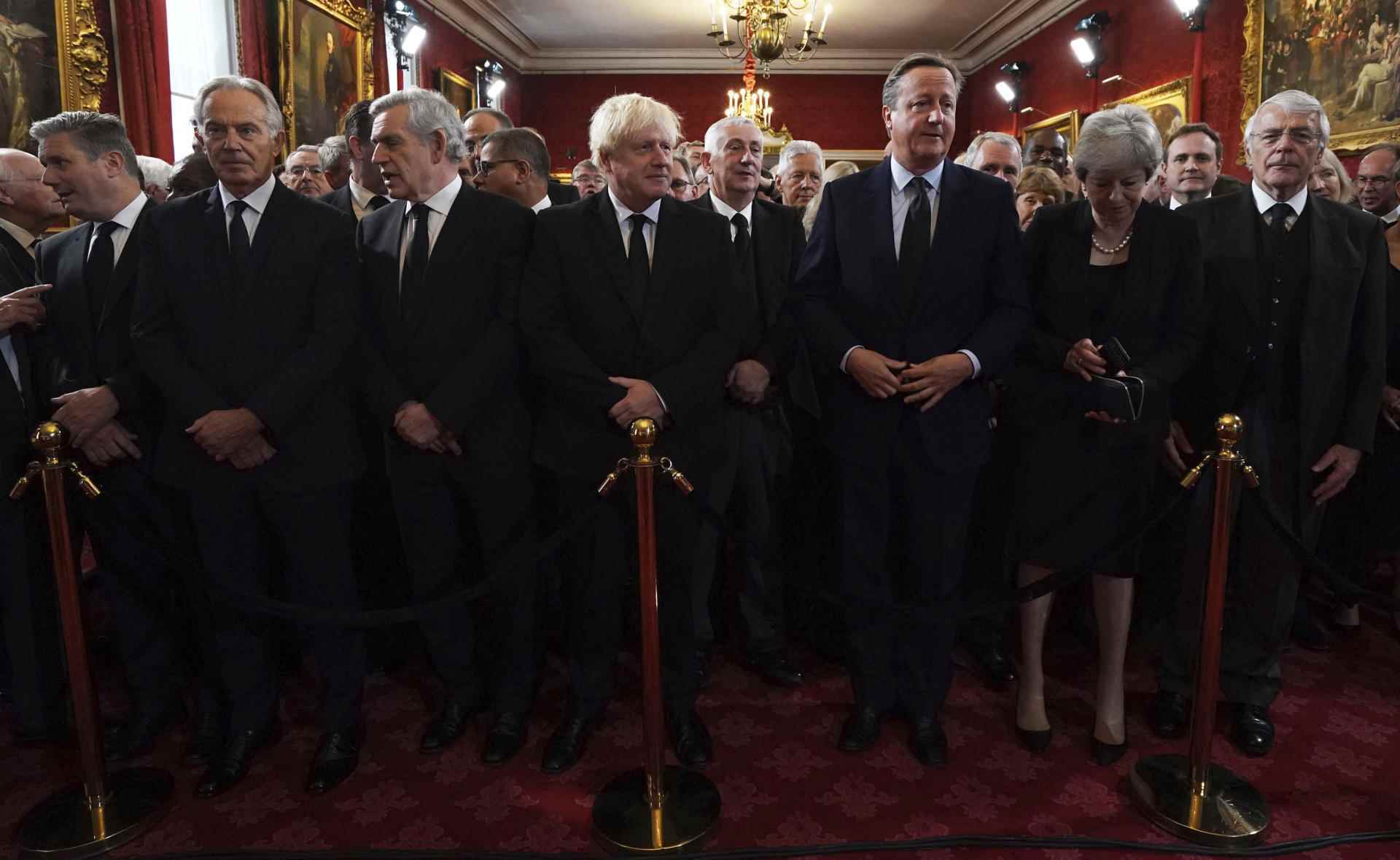 From left, Labor leader Keir Starmer, former prime ministers Tony Blair, Gordon Brown, Boris Johnson, David Cameron, Theresa May and John Major before the Membership Council ceremony at St. James's Palace , in London, Saturday September 10, 2022. House of Commons 'speaker' Lindsay Hoyle stands in the second row.