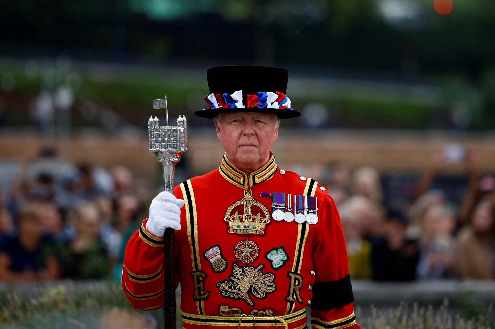 A guard attends a gun salute for King Charles III, at the Tower of London, September 10, 2022.