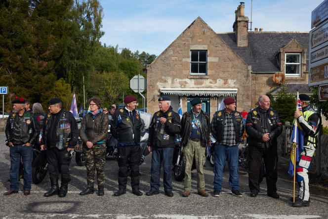 The Riders Branch of the Royal British Legion of Scotland awaits the passage of the royal funeral procession, in the village of Dinnet (Scotland), September 11, 2022.