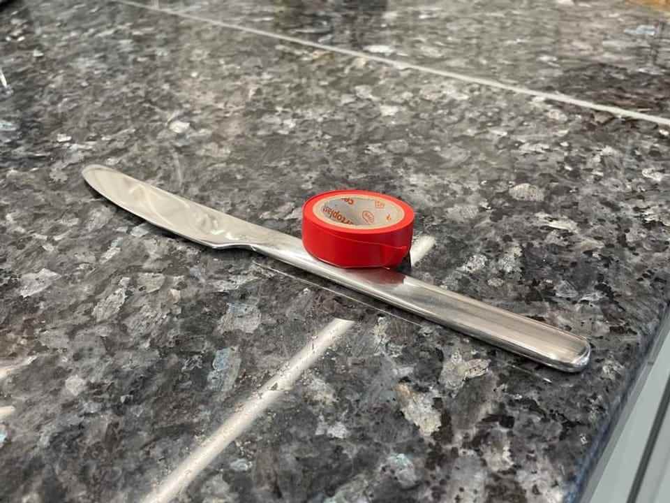 Knife with red tape