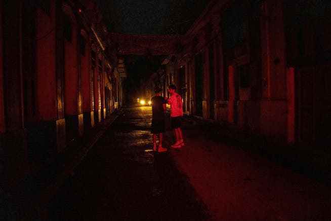 Cuba remained in the dark early Wednesday after Hurricane Ian knocked out the power grid.