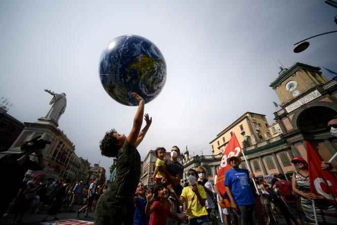 Demonstrators including members of Extinction Rebellion and Fridays for Future protest to demand more action as G20 climate and environment ministers meet in Naples on July 22, 2021.