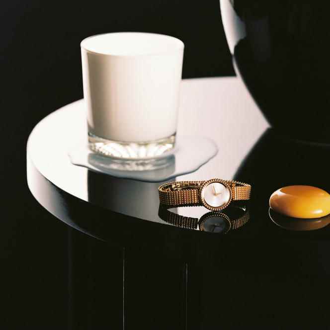 Perlée watch, 23 mm in yellow gold, guilloché white mother-of-pearl, Swiss quartz movement, yellow gold bracelet, Van Cleef & Arpels, price on request.  vancleefarpels.com