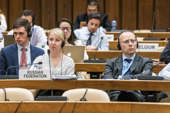 Russian diplomats, including Boris Bondarev (right), Russia's adviser to the United Nations in Geneva, May 11, 2022. 