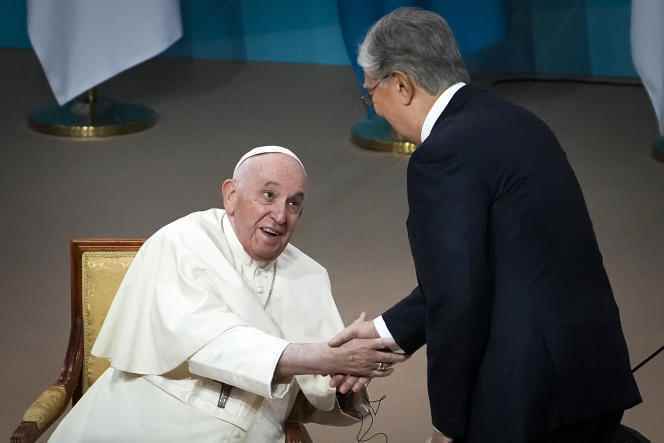Kazakhstan's President Kassym-Jomart Tokayev (right) greets Pope Francis before the pontiff's address to the political and diplomatic authorities gathered at the Kazakhstan Central Concert Hall, in Nursultan (Kazakhstan), September 13, 2022. 