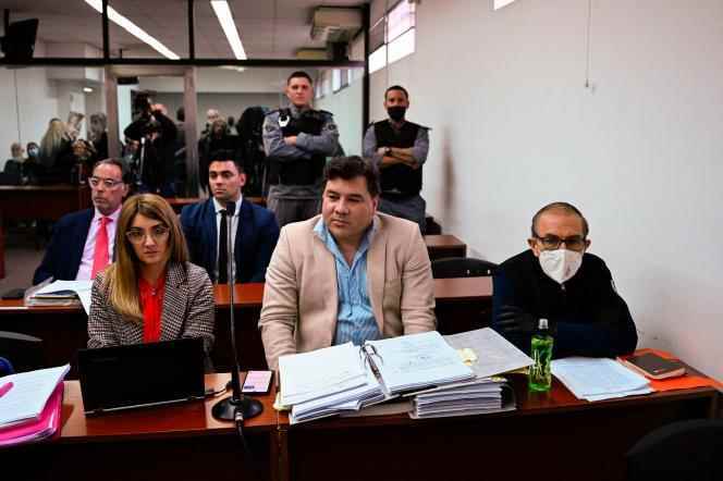 Former police officer Mario Sandoval (right), suspected of kidnapping a 24-year-old student during the dictatorship, attends the start of his trial, in Buenos Aires, September 14, 2022.