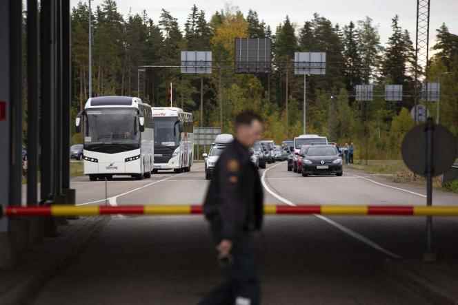 Vehicles wait to cross the border between Russia and Finland, in Virolahti, Finland, on September 23, 2022. Faced with the influx following the 