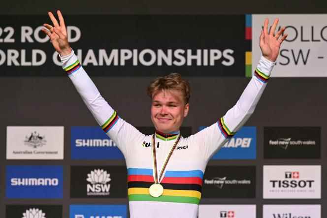 Norway's Tobias Foss celebrates his victory at the World Road Cycling Championships, in Wollongong, Australia, Sunday September 18, 2022.