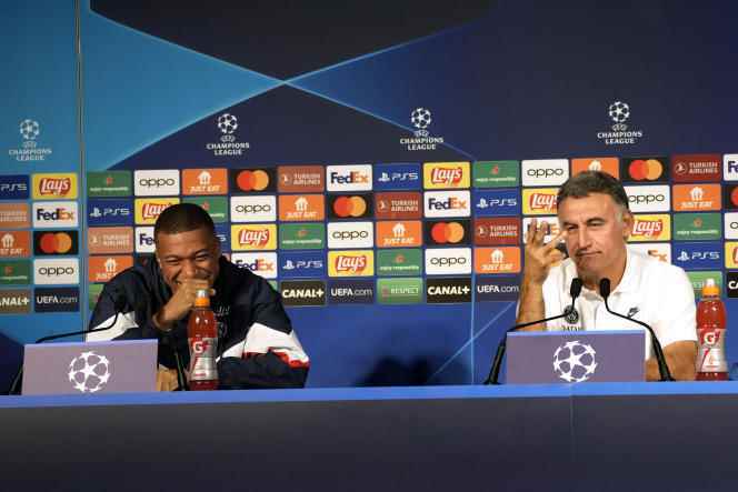 PSG striker Kylian Mbappé alongside his coach Christophe Galtier, during a press conference, September 5, 2022. 