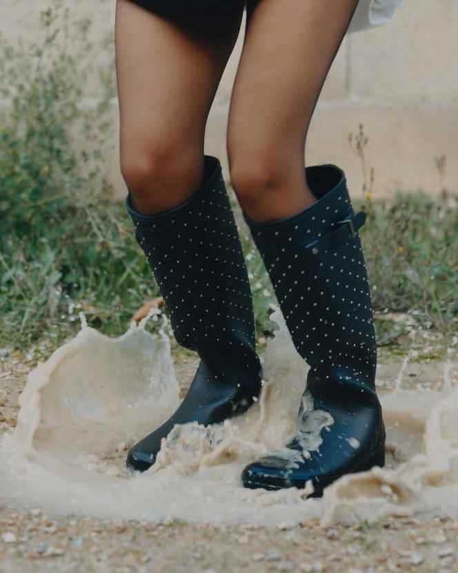 Studded rubber boots, Saint Laurent Rive Droite by Anthony Vaccarello × Hunter, €495.  ysl.com Saint Laurent tights.