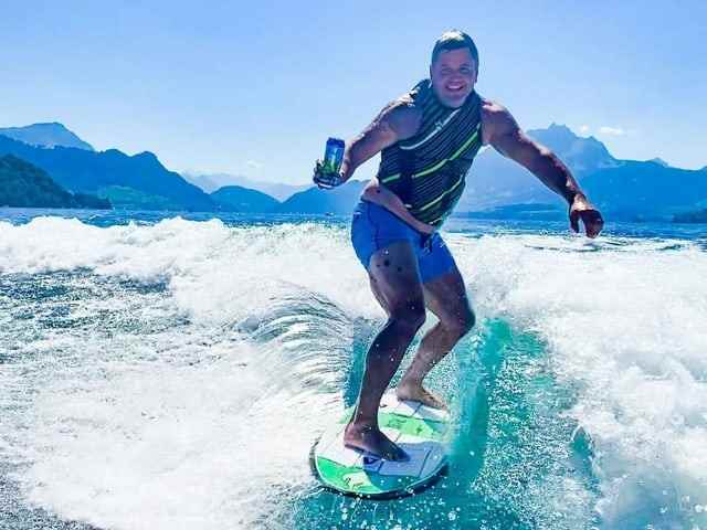 man on surfboard.