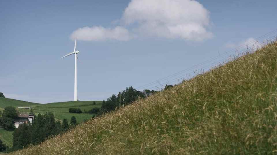 A windmill on a hill in Entlebuch.