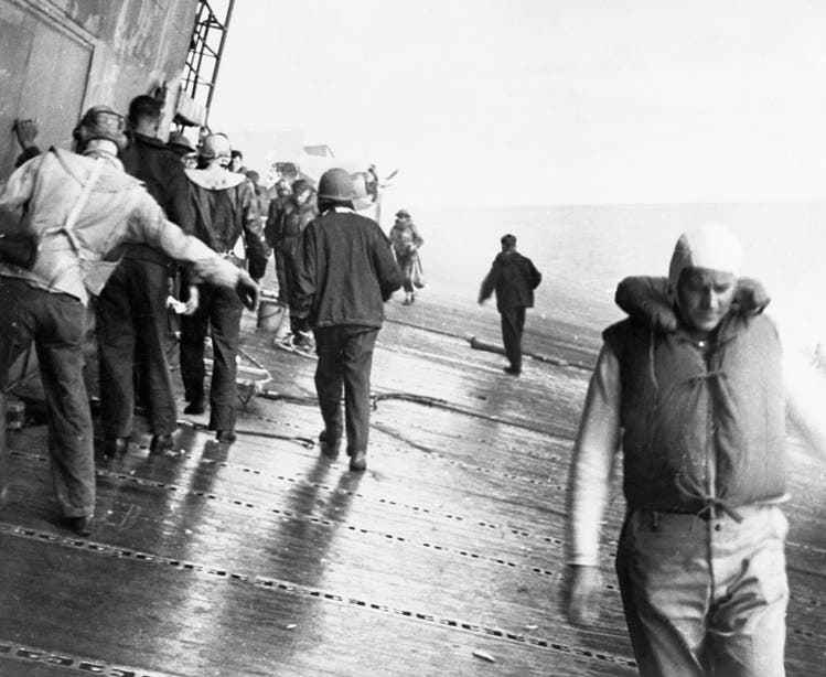On the deck of the badly hit 