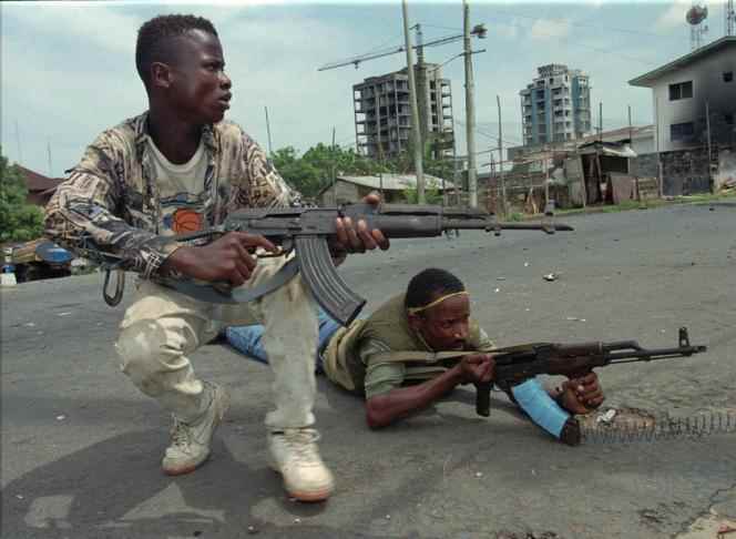 Fighters from the Liberia United Liberation Movement for Democracy (Ulimo) in Liberia's capital, Monrovia, on April 16, 1996, in the throes of a war between rebel groups.