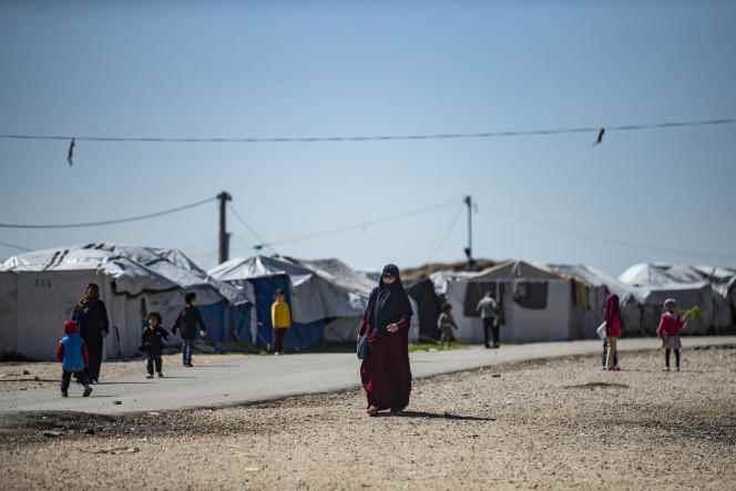 Women and children in Roj camp, near Al-Malikiyah, in Syria's northeast Hasakah province, March 28, 2021.