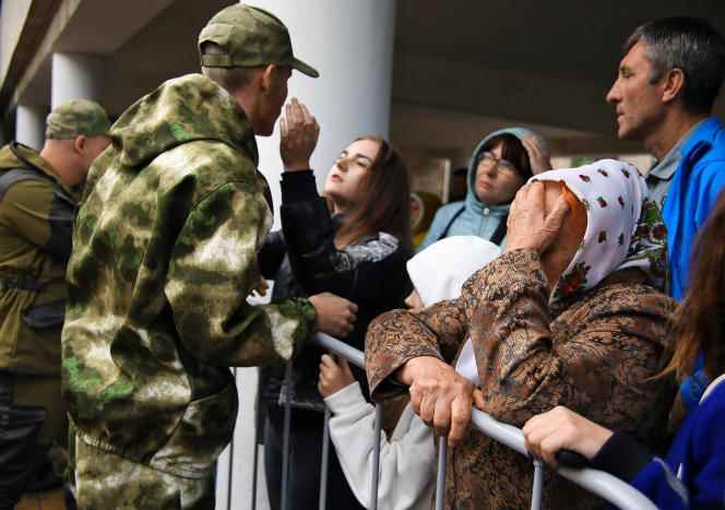 Russian soldiers say goodbye to their families, here in Bataysk, in the Rostov region, on September 26, 2022.