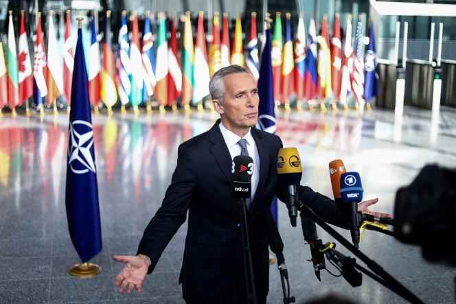 NATO Secretary General Jens Stoltenberg speaks to the press upon his arrival at the organization's headquarters in Brussels for the meeting of defense ministers of the member states of the Atlantic Alliance, which is due to last two days , October 12, 2022.  