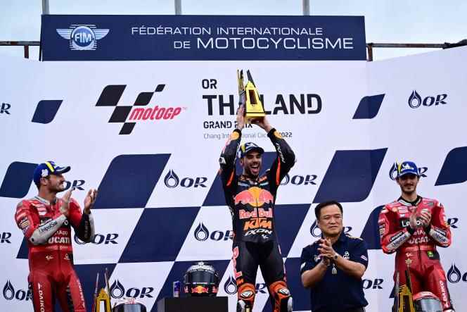 Portuguese Miguel Oliveira (centre), surrounded on the podium by Australian Jack Miller (left) and Italian Francesco Bagnaia, after his victory at the Thailand Grand Prix on Sunday 2 October.