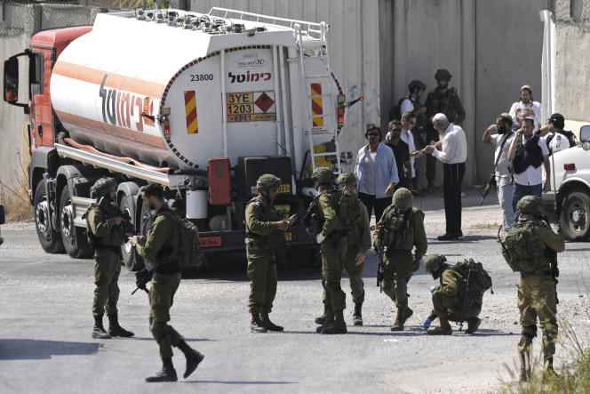 Israeli military forces near the site where a soldier was shot and killed near the Jewish settlement of Shavei Shomron in the West Bank on October 11, 2022.