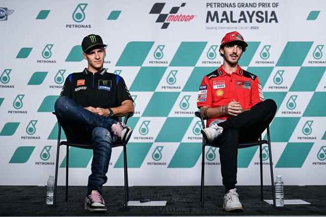 Francesco Bagnaia (right) and Fabio Quartararo (left), the two leaders of the MotoGP world championship standings, during a press conference in Sepang, Malaysia, on October 20, 2022.