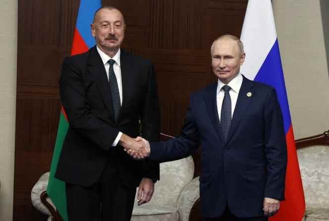 Vladimir Putin and Ilham Aliyev on October 13 in Astana, Kazakhstan.