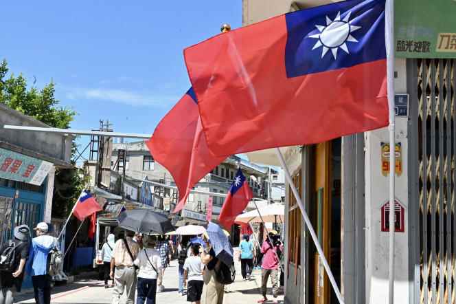 Taiwanese national flags flutter in the streets of the Kinmen Islands, a few kilometers from the Chinese coast, on August 11, 2022. 