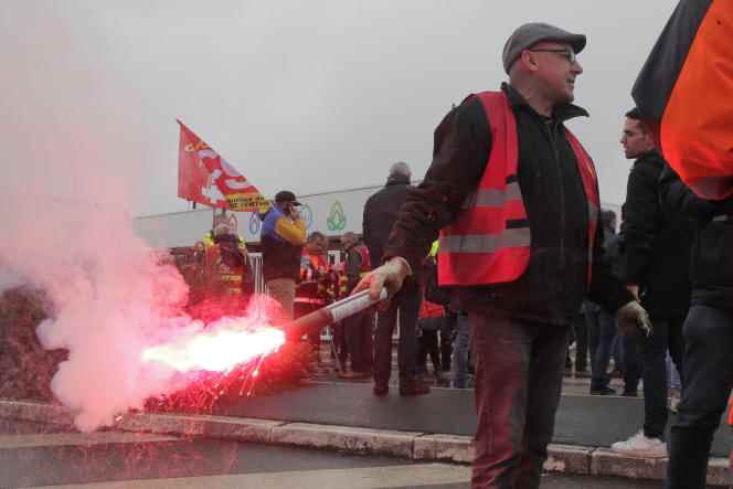 Strikers at the entrance to a TotalEnergies refinery in Dunkirk, France, on October 13, 2022.
