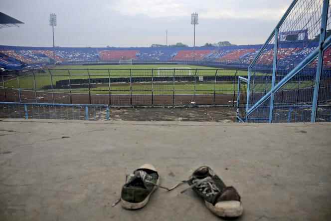 A pair of sneakers left by a spectator at the top of the steps of Kanjuruhan Stadium in Malang, Indonesia, after a deadly crowd movement that claimed the lives of more than 130 people on October 1, 2022. 