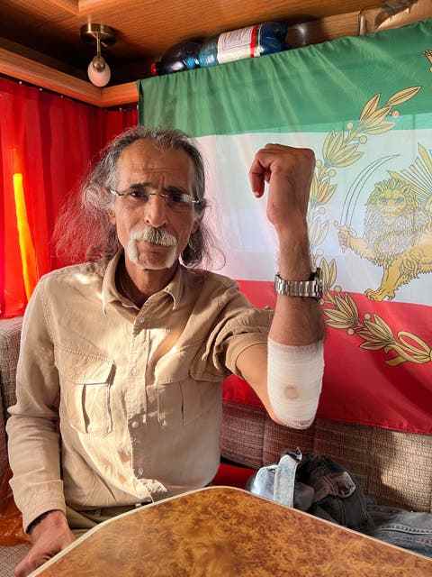 Saeed Ayhajan himself injured his arm while trying to help a beleaguered comrade-in-arms.