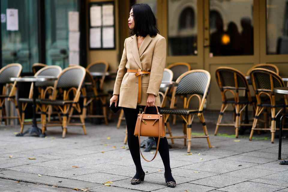 Blazer as a total look with opaque tights and belt, street style