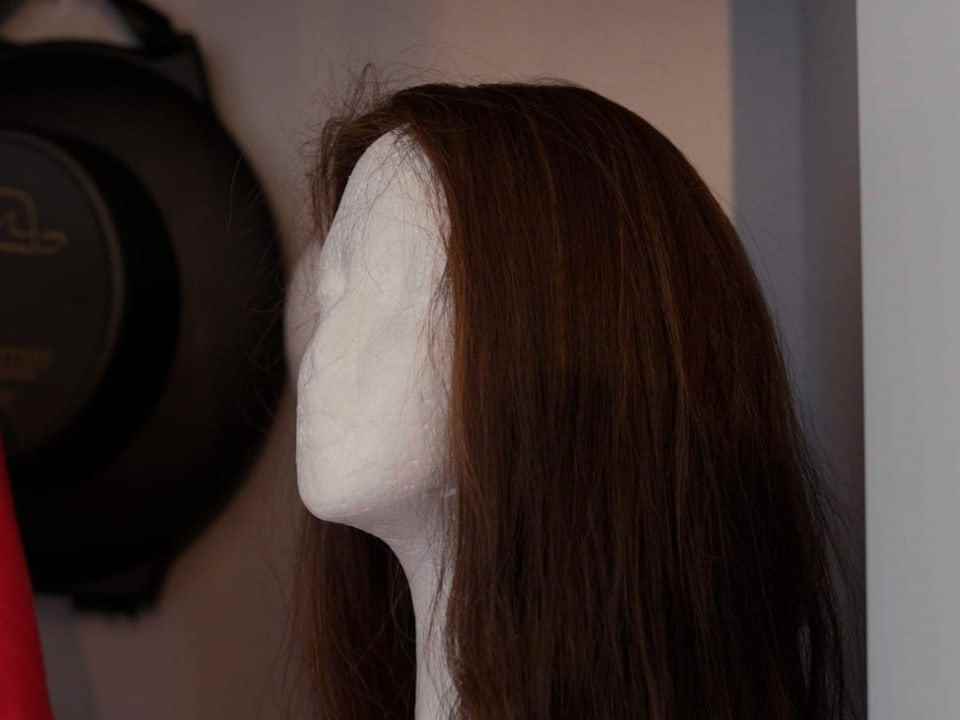 Shterny's second wig on a doll.