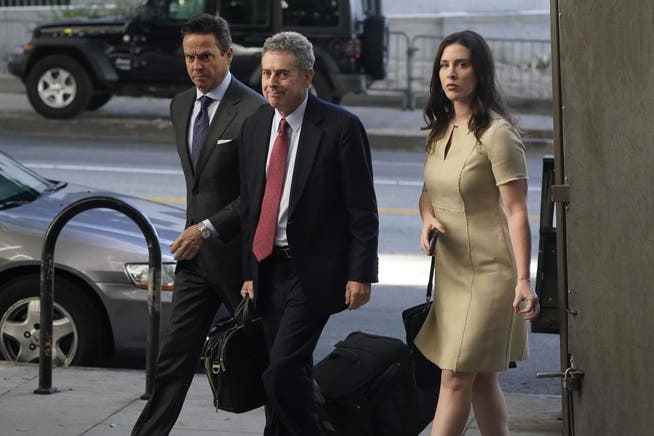 Harvey Weinstein's attorneys Alan Jackson (left), Mark Werksman (center) and Jacqueline Sparagna arrive at court in Los Angeles on October 24, 2022. 