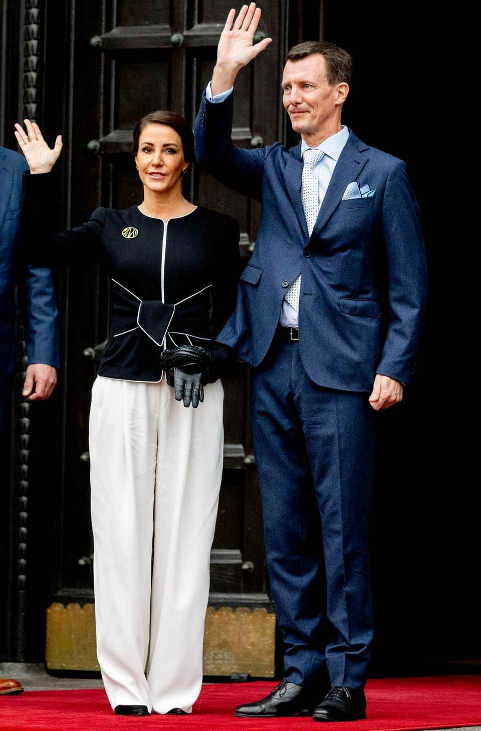 Princess Marie uses power dressing with her pants suit. 