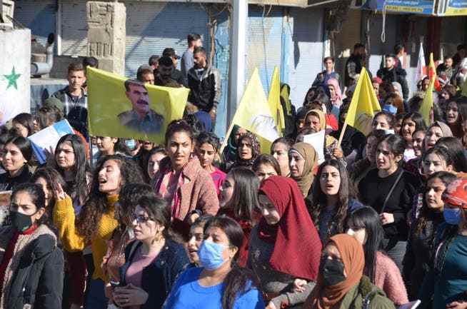 Female supporters of the Kurdish PKK and the Syrian Democratic Front (SDF) protest against the Turkish airstrikes in north-eastern Syria.