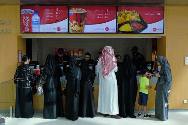 Saudi women are now allowed to go to the cinema, but for many of the new freedoms they still need the consent of their husbands or fathers. 