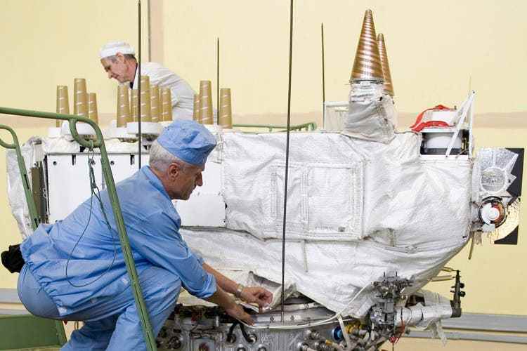 Engineers prepare a Glonass satellite for launch.