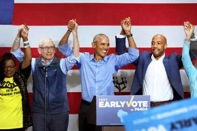 Former President Barack Obama at a rally for Democratic Senate candidate Mandela Barnes (right) in Milwaukee, Wisconsin on October 29, 2022. Left is Democratic State Governor Tony Evers in running for re-election.