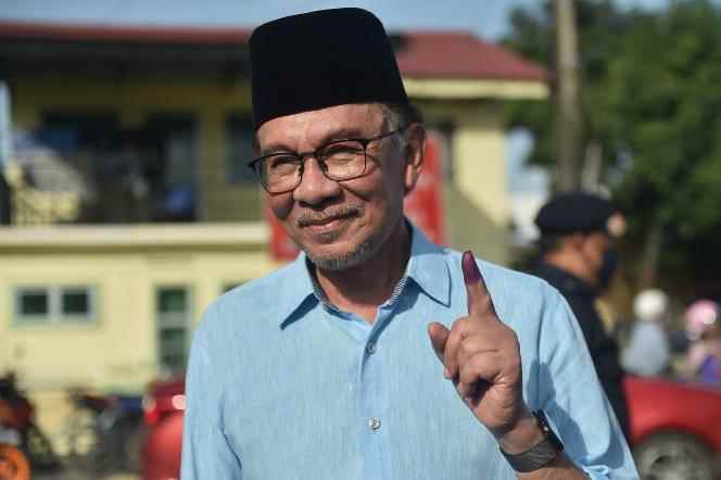 Anwar Ibrahim leaving the polling station where he cast his ballot, in Permatang Pauh, Penang State, November 19, 2022. 