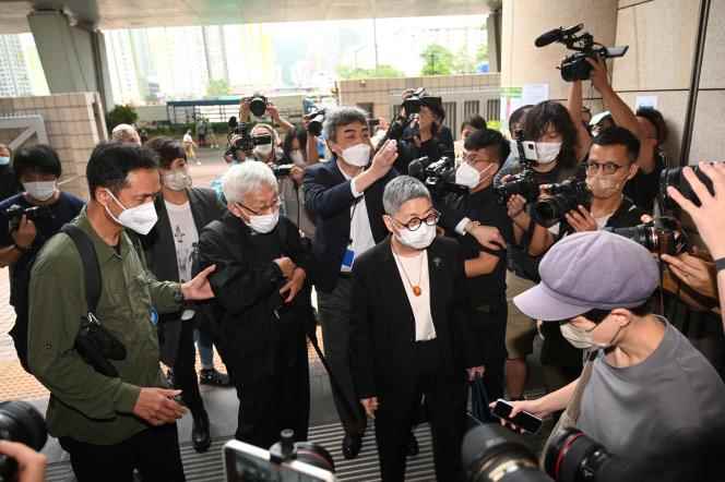 From left, pro-democracy activists Hui Po-keung, singer Denise Ho, Cardinal Joseph Zen and magistrate Margaret Ng arrive in court in Hong Kong May 24, following their arrest on charges of conspiracy to collusion with foreign forces. 