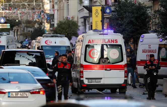 Ambulances arrive near the scene after an explosion in Istanbul's central Taksim district on November 13, 2022. 