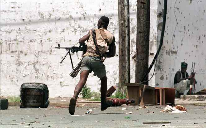 A fighter from Charles Taylor's National Patriotic Front of Liberia (NPFL) in Monrovia in May 1996.