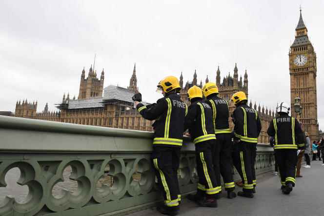 Members of the fire brigade on Westminster Bridge in London in March 2017. 