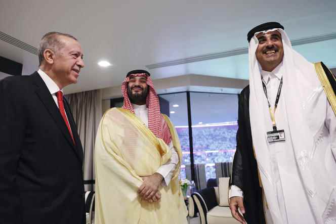 The Emir of Qatar Tamim Bin Hamad Al Thani (right) receives Turkish President Recep Tayyip Erdogan (left) and Saudi Crown Prince Mohammed Bin Salman (center) for the opening ceremony of the World Cup on November 20 in Doha, Qatar.