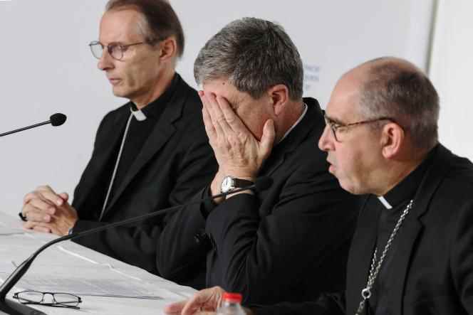 The Archbishop of Reims and President of the Conference of Bishops of France (CEF) Eric de Moulins-Beaufort, surrounded by the Bishop of Nîmes Nicolas Brouwet (on the left) and the Bishop of Nanterre Matthieu Rougé (on the right), during the press conference of the last day of the CEF, in Lourdes (Hautes-Pyrénées), on November 8, 2022.