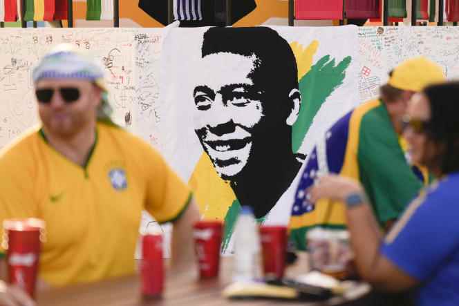 A portrait of Pelé displayed in a fan zone before the World Cup match between Brazil and South Korea, Monday, December 5, 2022, in Doha (Qatar).