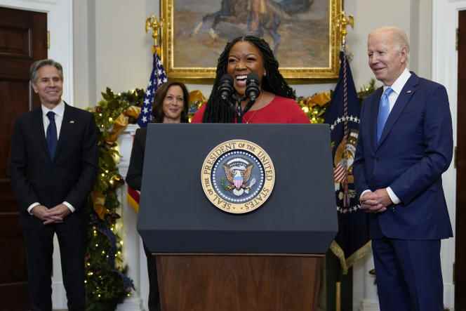 The basketball player's wife, Cherelle Griner, stands with US President Joe Biden at the December 8 prisoner swap announcement at the White House in Washington.