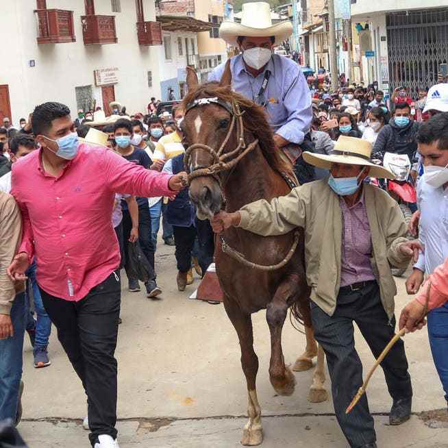 In April 2021, Pedro Castillo rode a horse to the ballot box in Cajamarca to cast his ballot.