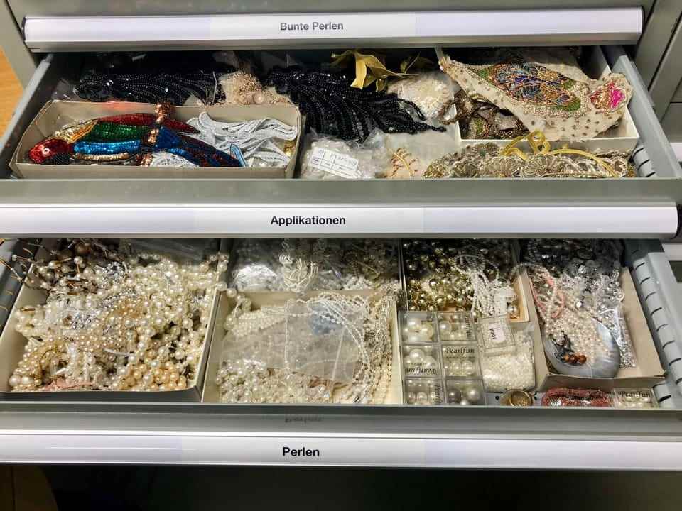 Drawers full of beads and other appliqués