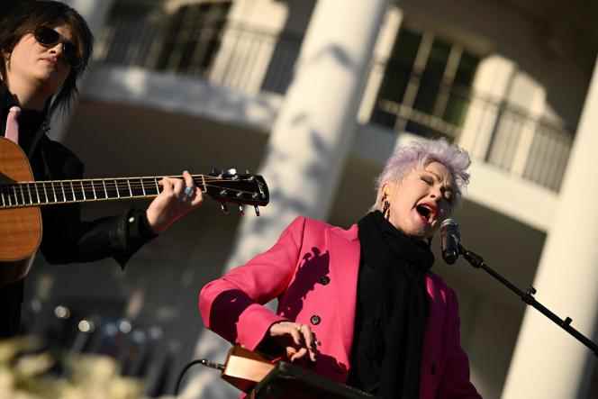 Singer Cyndi Lauper performs one of her songs outside the White House on December 13, 2022.
