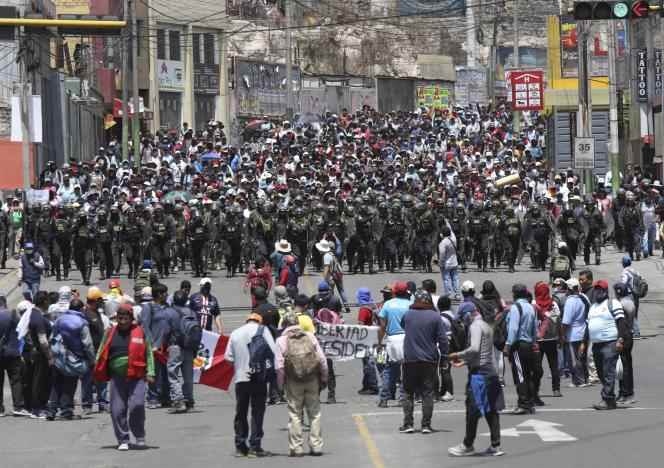 Police arrive where supporters of ousted Peruvian President Pedro Castillo protest his detention, in Arequipa, Peru, Wednesday, Dec. 14, 2022.